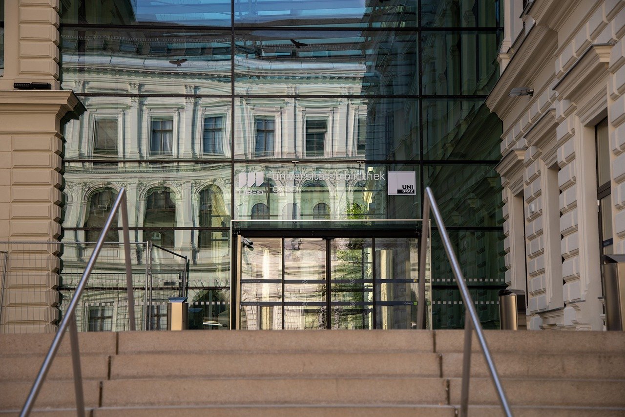 steps leading to historic building with a library